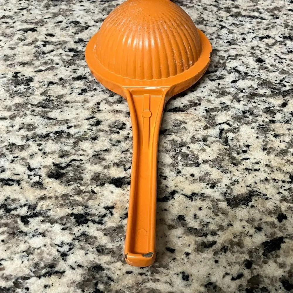 Well-Loved Hand Held Orange Squeezer